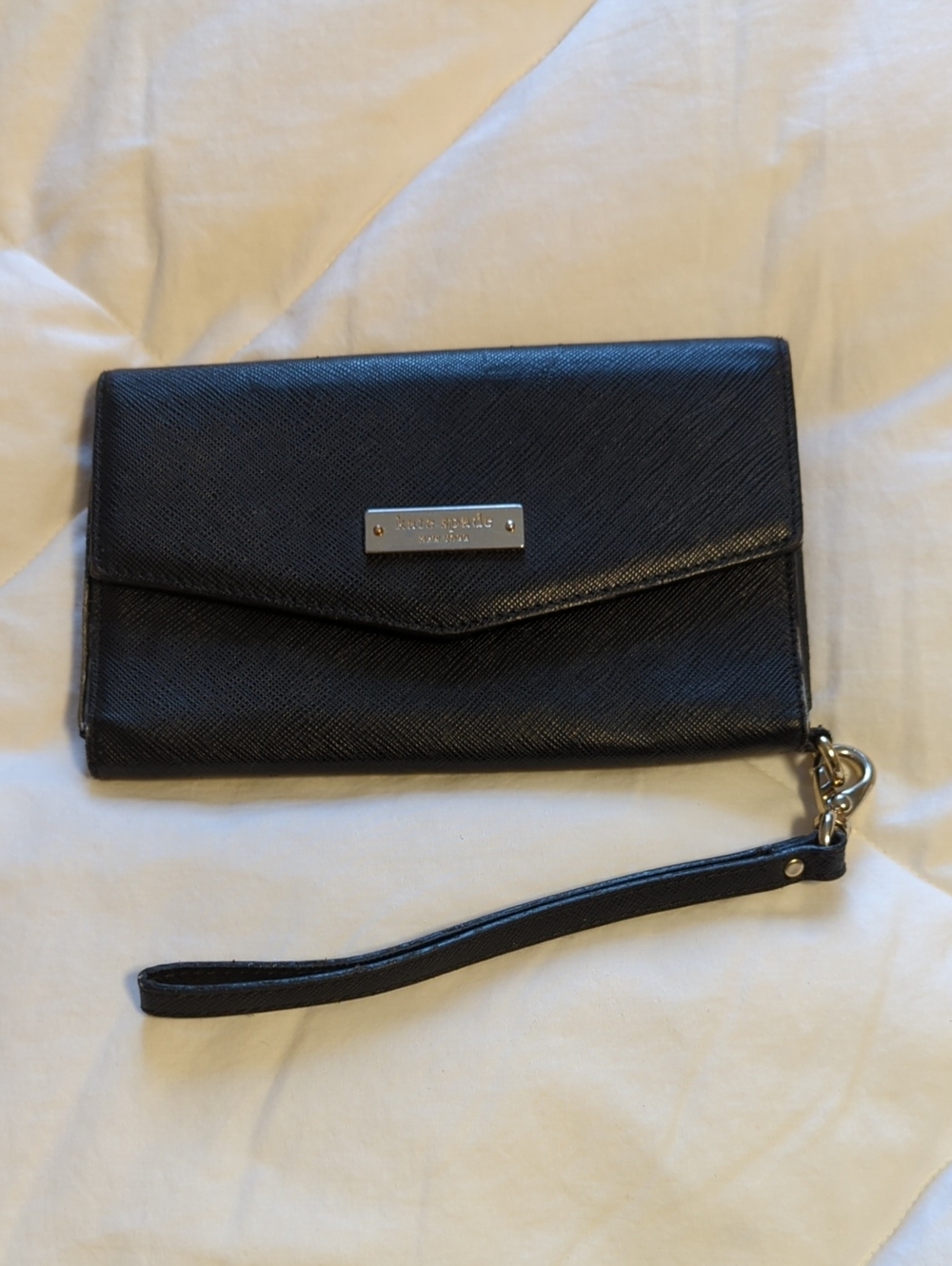 kate spade black leather wristlet clutch with silver plaque